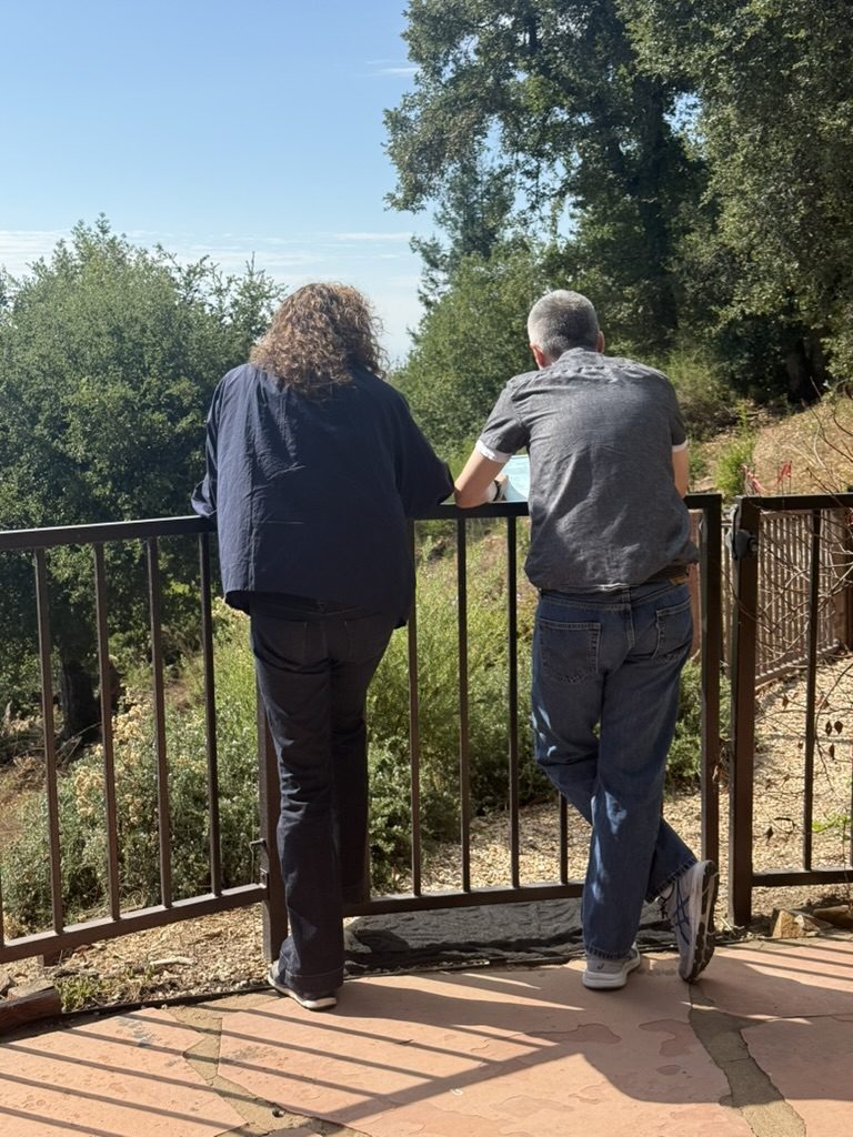 A one-on-one coaching conversation at the overlook